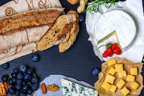 Various Types Cheese Brie Camembert Roquefort Berries Stone Board Menu — Stock Photo, Image