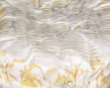 Makarna peynirli camembert veya brie yakın doku- süt üretimi. Kopyalama alanı olan en üstteki görüntü. Gıda arkaplanı.