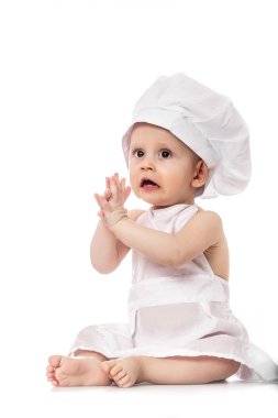 Küçük şef. komik bebek duygular. Bebek çocuk s şefin şapka giymiş. beyaz izole. büyük boy çözünürlük. Gıda afiş metin veya tasarım için.