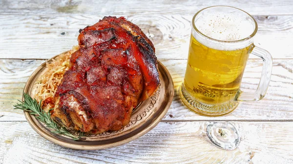 Roasted Pork knuckle with beer and sauerkraut. Oktoberfest menu — Stock Photo, Image