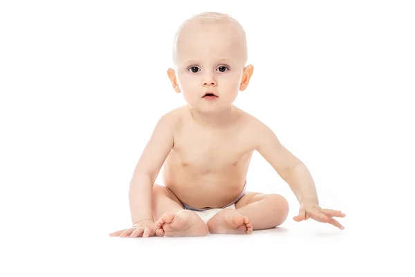 Baby sitting on white background. space for text. — Stock Photo, Image