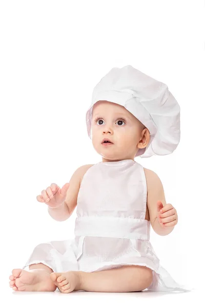 Little Chef. Adorable baby boy dressed in s chef's hat. isolated on white. Toddler playing. big size resolution. Food banner for text or design — Stock Photo, Image