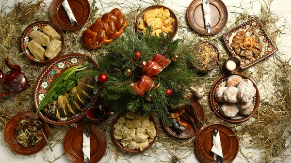 Christmas Family Dinner Table Concept. traditional Christmas sweet meal in Ukraine, Belarus and Poland, on wooden table — Stock Photo, Image