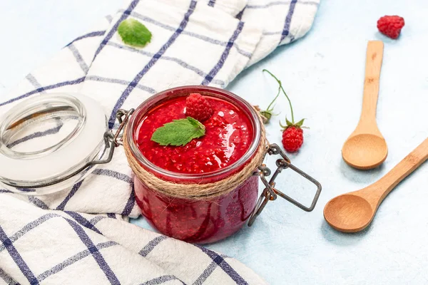 Raspberry jam marmalade and fresh raspberry. Healthy vegan food concept. Sugar, gluten free dessert.