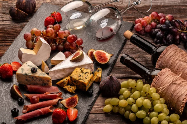 Still Life Food Composition Assorted Cheese Glass Wine Fruits Wooden — Stock Photo, Image