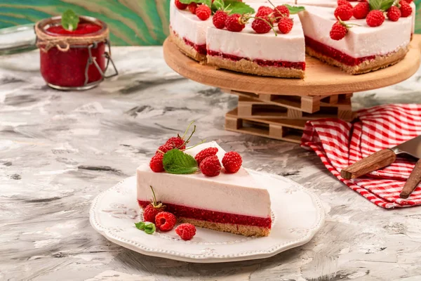 piece delicious raspberry cheesecake, trifle, mouse. sweet raspberry dessert.