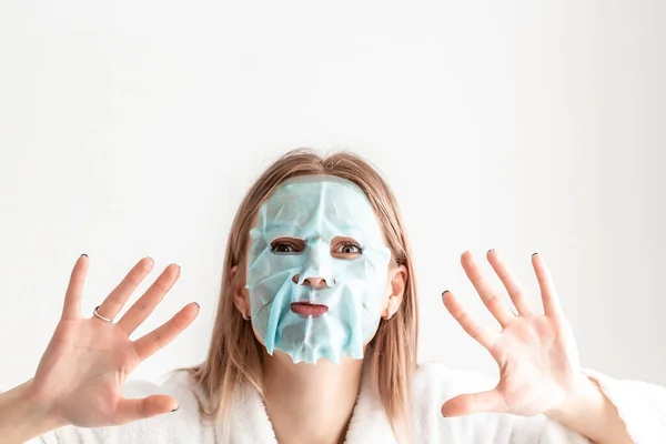 Beautiful Young Caucasian Lady Funny Posing Face Sheet Mask Face — Stock Photo, Image