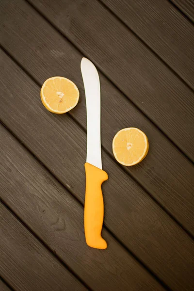 Knife and lemon in cut