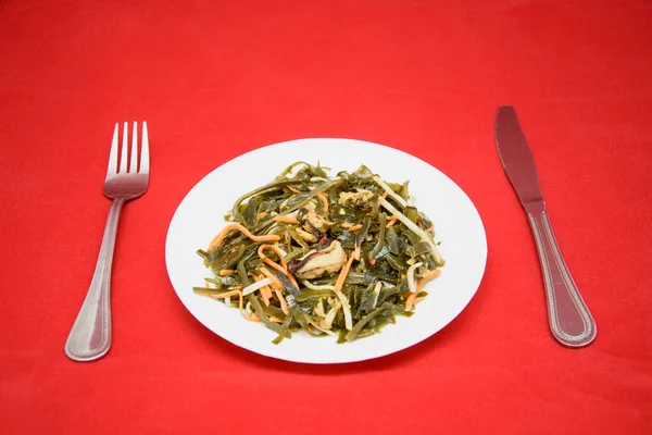 Sea Kale Plate Red Background — Stock Photo, Image