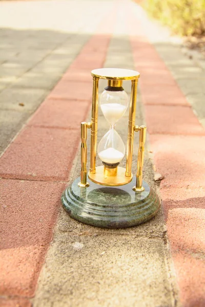 stock image Beautiful hourglass stand against the background of beautiful nature