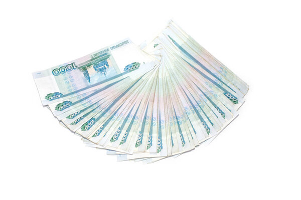 fan of Russian money banknotes rouble on white isolated background. in nominal value of one thousand. Rich concept