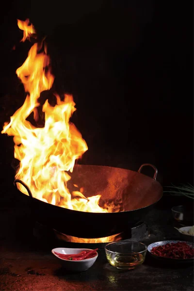 Flame in a iron pot used Chinese cooking