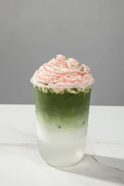 Snow area matcha latte in a clean glass