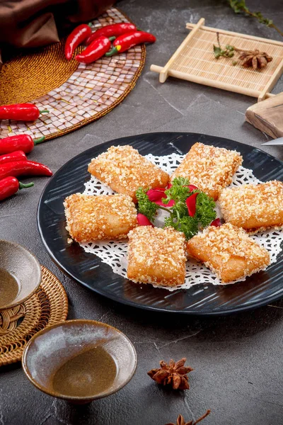 Fried turnip cake in a black dish