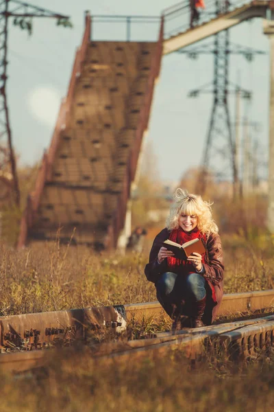 Young Blonde Woman Holding Book Posing Sitting Rails Vintage Atmosphere — Stock Photo, Image