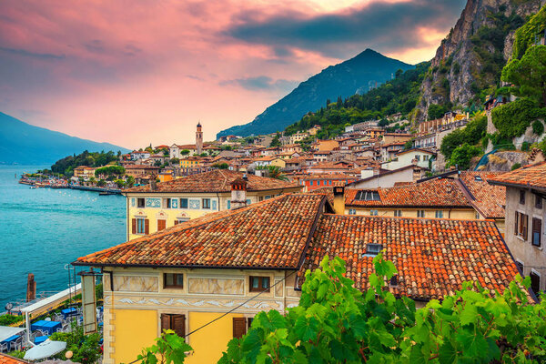 Gorgeous mediterranean touristic resort and spectacular cityscape panorama with lake Garda, Limone sul Garda, Lombardy region, Italy, Europe