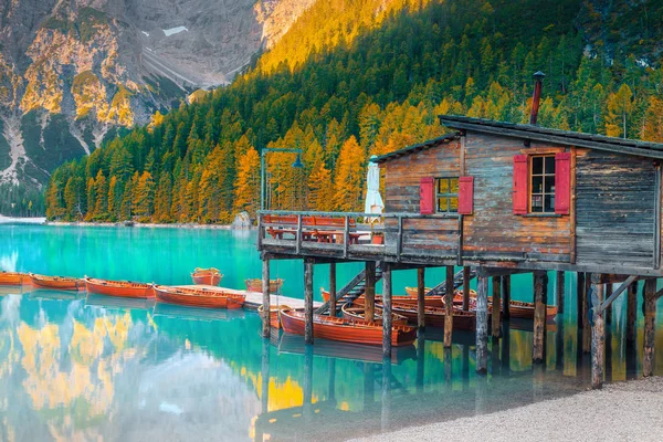 Cute wooden boathouse on the alpine lake, Dolomites, Italy, Europe — Stock Photo, Image