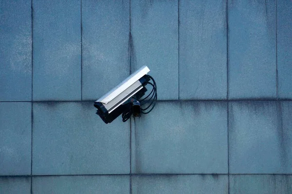 security camera on the wall, old technology