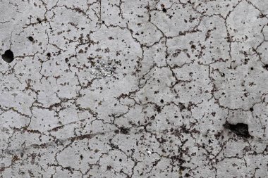 Eski ve yıpranmış çimento duvarlarında çatlaklar yakın çekim