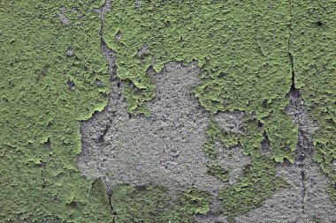 Eski yıpranmış boya ile duvarın kabukları çatlaklar