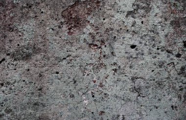 Yüksek çözünürlükte yaşlı yıpranmış çimento duvarlarında çatlaklar yakın çekim