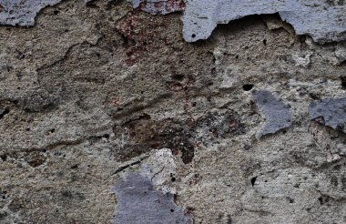 Yüksek çözünürlükte yaşlı yıpranmış çimento duvarlarında çatlaklar yakın çekim