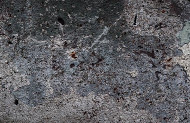 Yüksek çözünürlükte yaşlı yıpranmış çimento duvarlarında çatlaklar yakın çekim