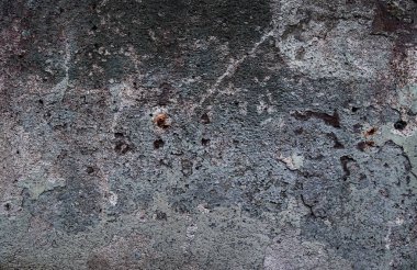 Yüksek çözünürlükte yaşlı yıpranmış çimento duvarlarında çatlaklar yakın çekim