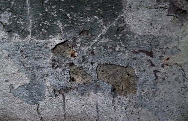 Yüksek çözünürlükte yaşlı yıpranmış çimento duvarlarında çatlaklar yakın çekim