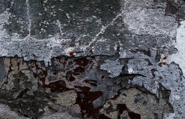 Yüksek çözünürlükte yaşlı yıpranmış çimento duvarlarında çatlaklar yakın çekim