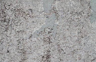 Yaşlı yıpranmış çimento ve beton duvarlar farklı binaların çatlaklar, yakın çekim