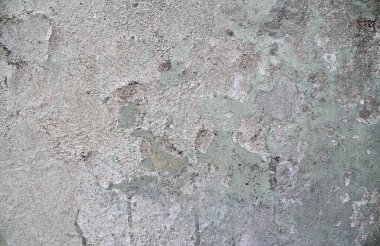 Yaşlı yıpranmış çimento ve beton duvarlar farklı binaların çatlaklar, yakın çekim