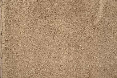 Eski ve yıpranmış çimento ve beton duvar yüzeyine kadar kapatın