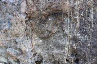 Granit duvarlar ve kayalar çatlaklar ve çarpıcı yapıları ile yüksek çözünürlükte doku kapatın