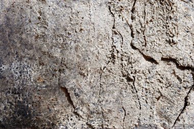 Yakın yüksek çözünürlükte granit ve beton duvar yüzeyine kadar ayrıntılı