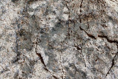 Yakın yüksek çözünürlükte granit ve beton duvar yüzeyine kadar ayrıntılı