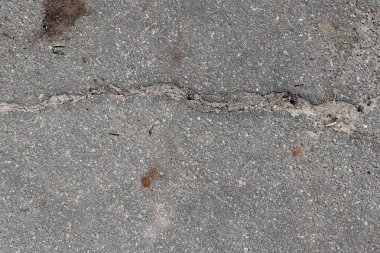 Çatlamış asfalt yolların yüzeyini yüksek çözünürlükte kapatın