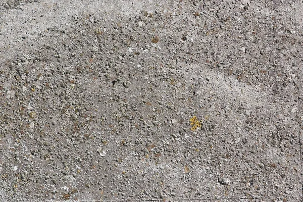 Detailed surface of aged and weathered concrete and cement walls with cracks in high resolution