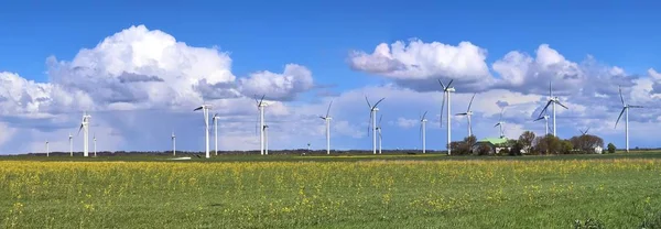 High reoslution panorama of a regenerative energy wind mill park seen in northern germany on a sunny day