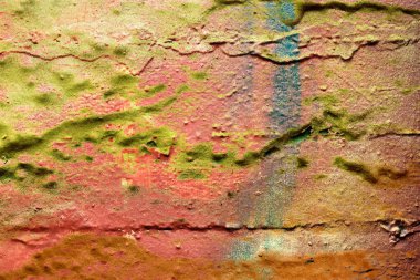 Yüksek çözünürlükte beton ve çimento duvarlara püskürtülen renkli boyanın yakın yüzeyi