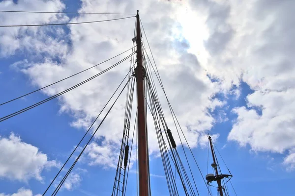 Old sailing ship mast and rope at the port of Kiel on a sunny day