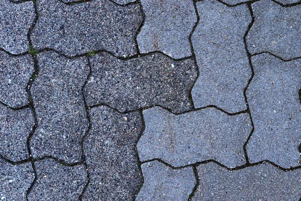 高い再吸収の石畳の道路舗装の詳細なビューを閉じます — ストック写真