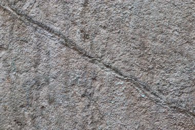 Kuzey Almanya ve Danimarka'da bulunan bazı çatlaklar ile yapılandırılmış bir beton duvarın detaylı yakın çekim