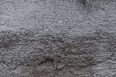 Yüksek çözünürlükte yaşlı ve yıpranmış beton duvar dokularının detaylı yakın yüzeyi