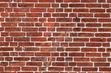 Yüksek çözünürlükte bazı çatlaklar ile kırmızı yıpranmış tuğla duvarlarda ayrıntılı yakın görünüm