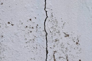 Ayrıntılı ve renkli. Yüksek çözünürlüklü beton duvar dokusunda çatlak ve kabuk soyma boyası.