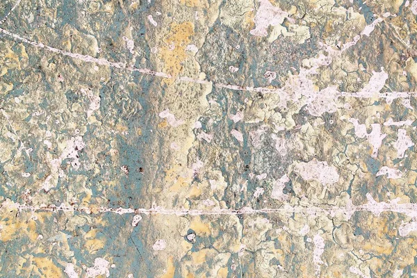 Yüksek çözünürlükte çatlak ve boya ile yaşlı ve yıpranmış beton duvarların ayrıntılı yakın görünümü