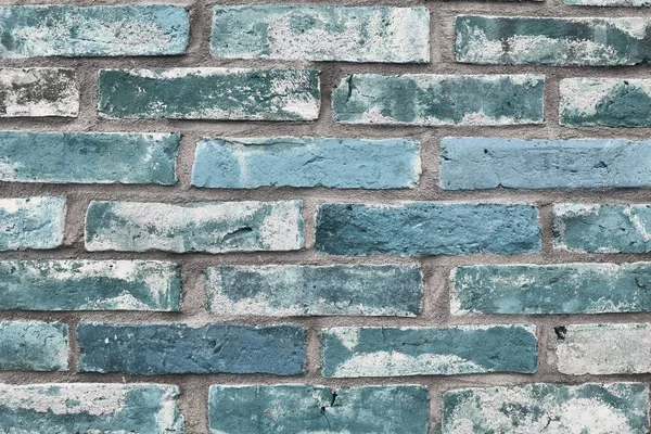 Detailed close up view on old aged blue brick walls in high resolution