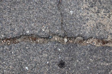 Farklı yol ve sokaklarda asfalt dokusu hakkında detaylı yakın görünüm