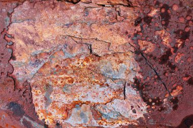 Yüksek çözünürlükte yıpranmış paslı metalin ayrıntılı yakın görünümü